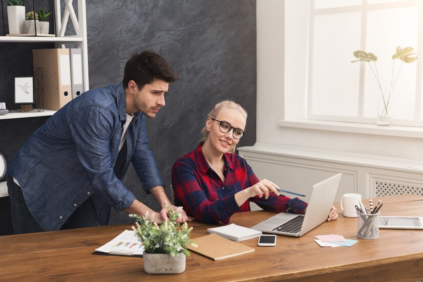 Couple Business Partners Working Modern Office Two Coworkers Discussing New Project While Working Laptop Copy Space 116547 3444