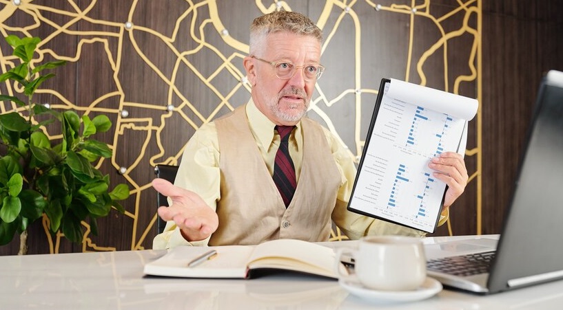 Mature Businessman Showing Chart With Financial Report When Video Calling Business Partner 274689 17048